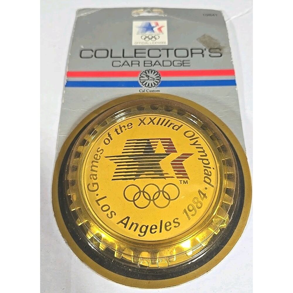 1984 Customs Games of the XXIIIrd Olympiad Los Angeles Metal Car Emblem NOS U294